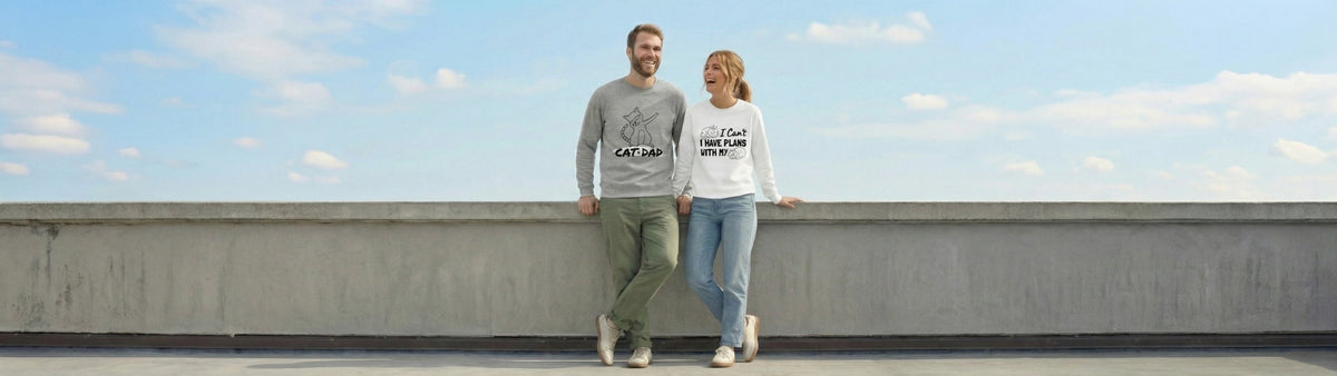 Two people standing on a rooftop with a clear blue sky.